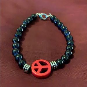 Glass beaded peace sign bracelet